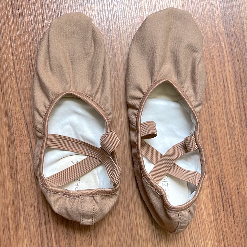 New, never been worn tan Capezio dance shoes. Tag says size 11m, fits like 8.5.